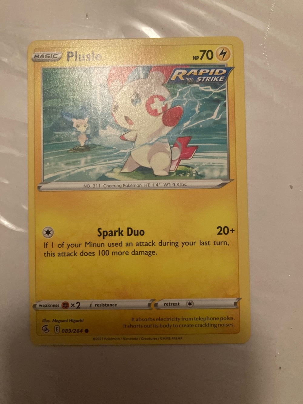 Pokemon Plusle Rapid Strike Card - Yellow
